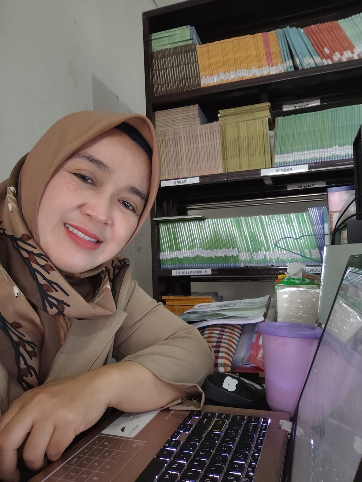 Ayi Habibah, S.Pd. M.M.,Gr.